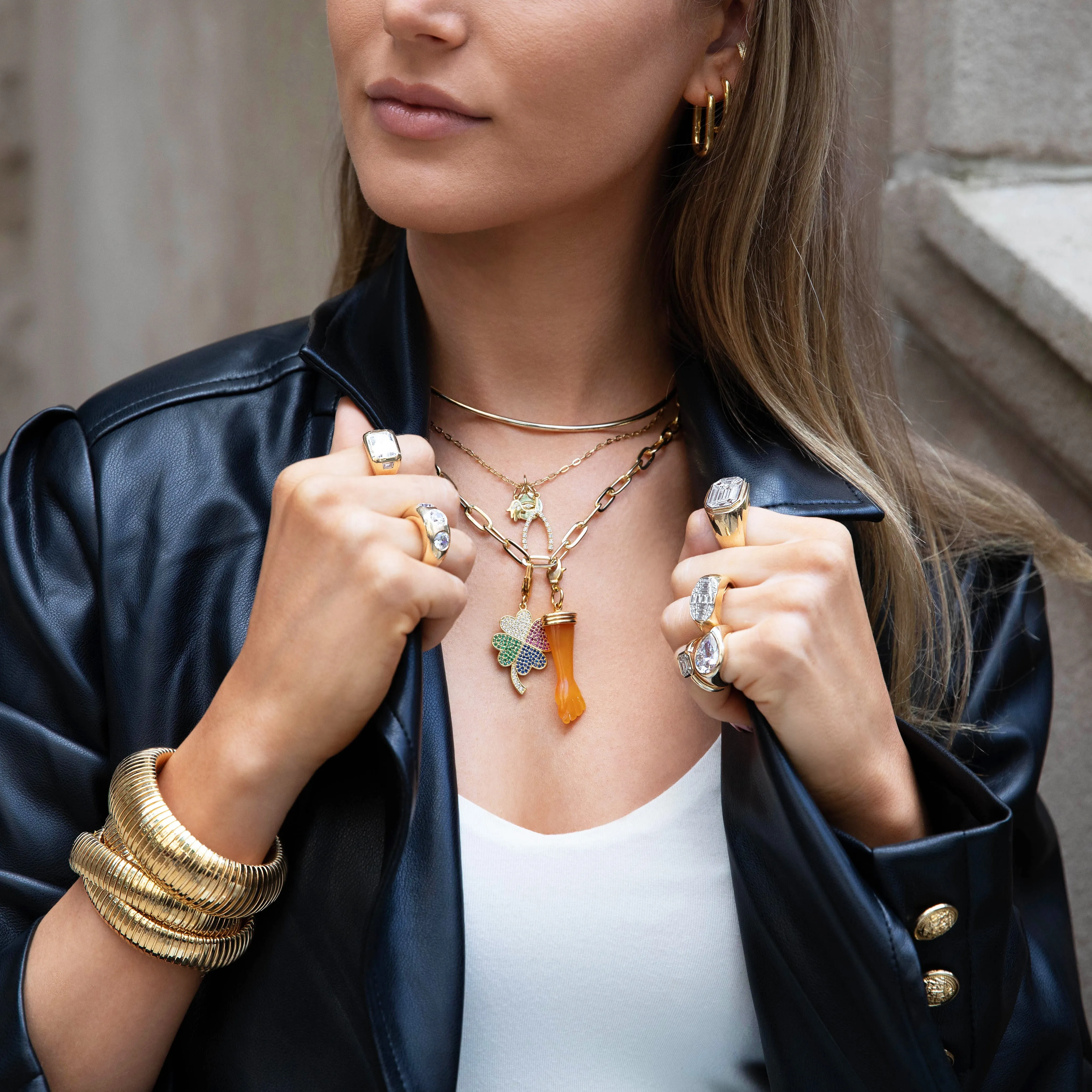 Amber Figa Fist Charm